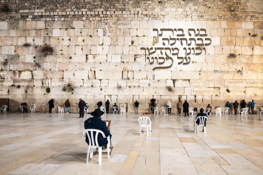Kosel prayer Sukkah mural with people at the Western Wall